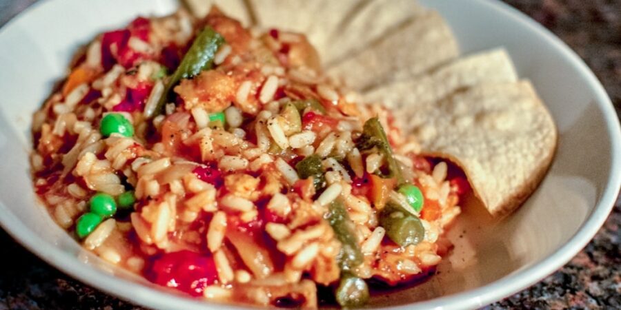 Vegan Mexican Rice in bowl with tortilla chips