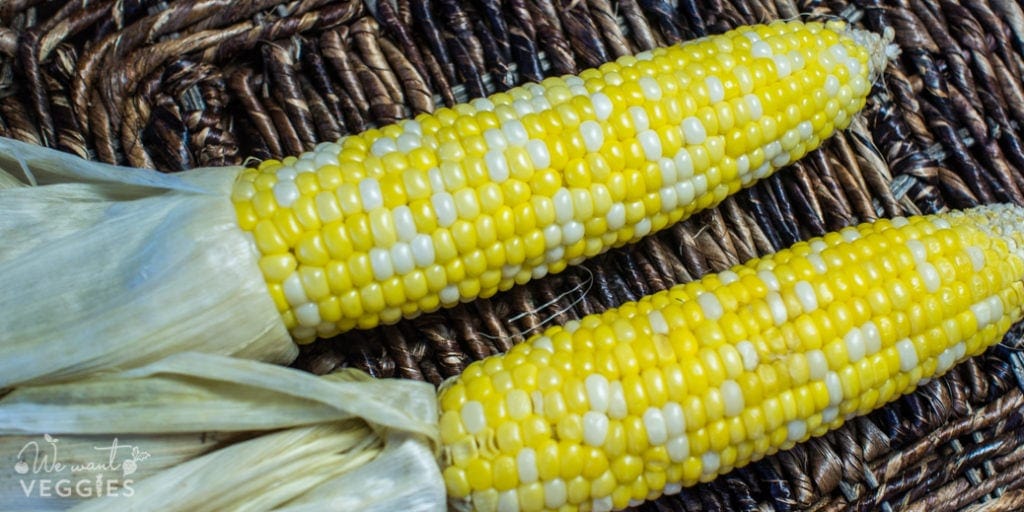 Corn with husks pulled back