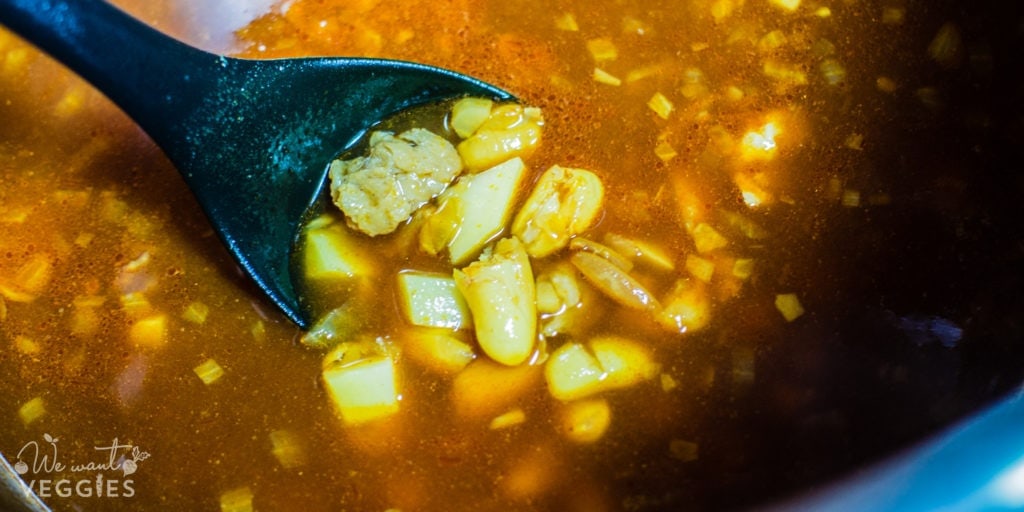 Simmer cannellini bean soup.