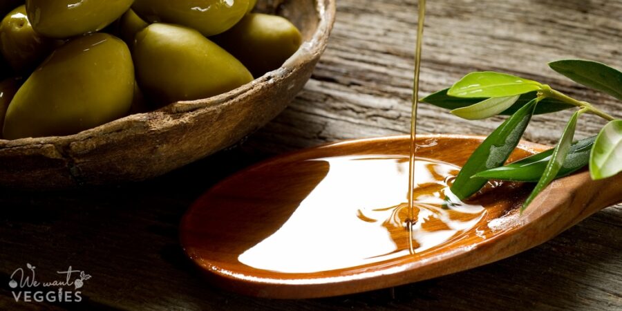 olive oil over spoon