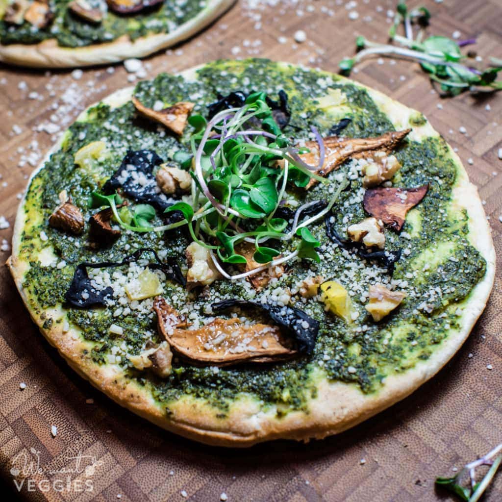 A delicious Forager Pita Pizza on a cutting board