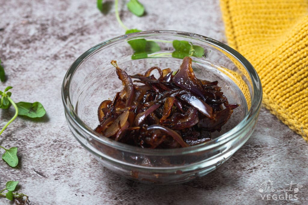 Caramelized onion in a small glass bowl