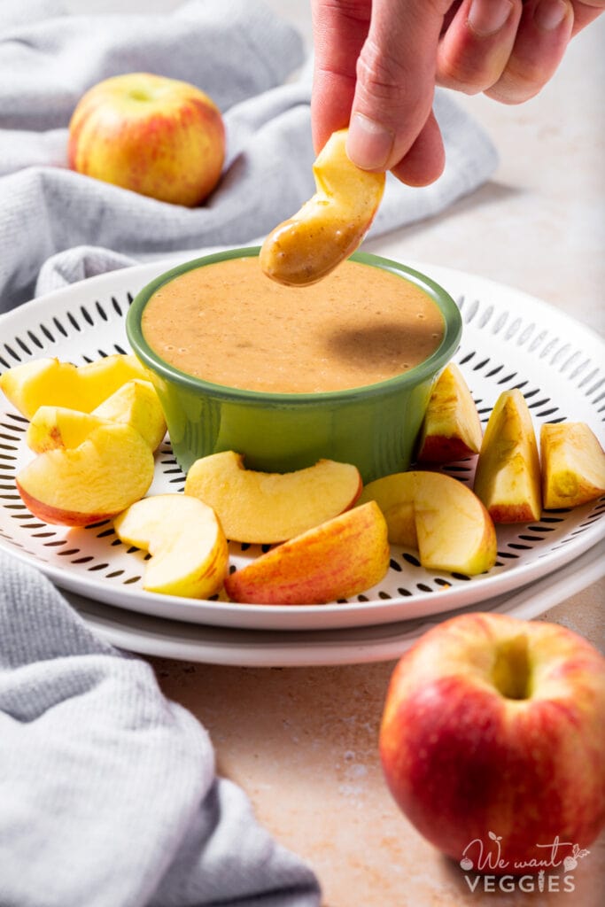 Fresh apple dipped in sweet apple dip