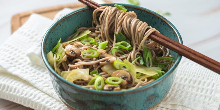 Mushroom ramen in a bowl with chopsticks