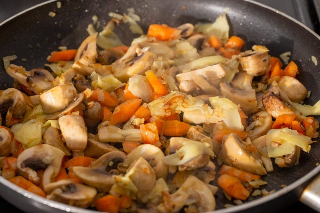 All vegetables simmering in pan