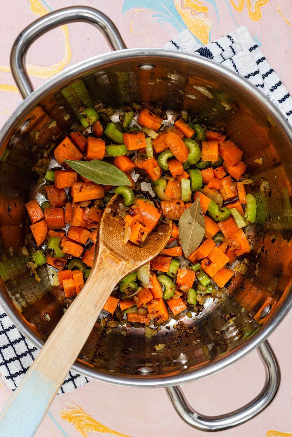 Vegetables cooking in pot.