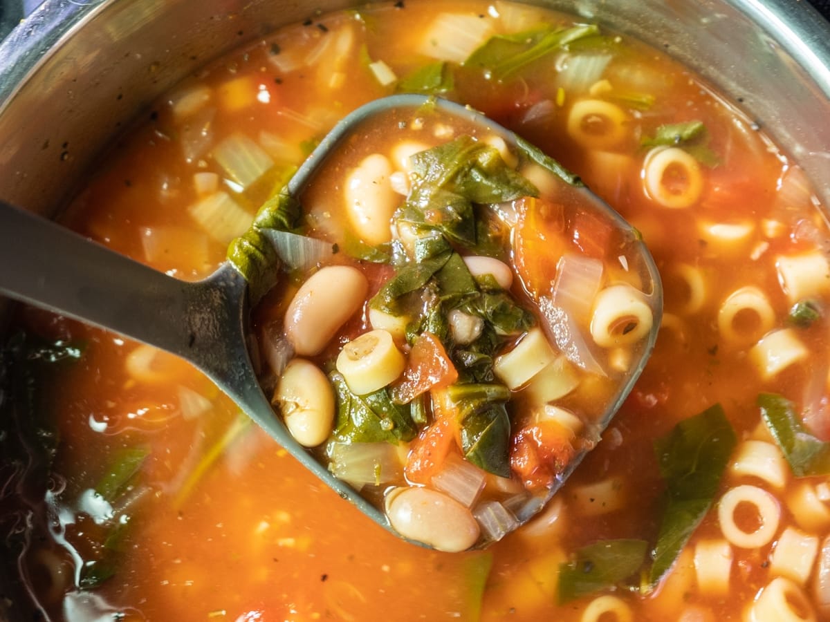 Tomato Florentine Soup in ladle