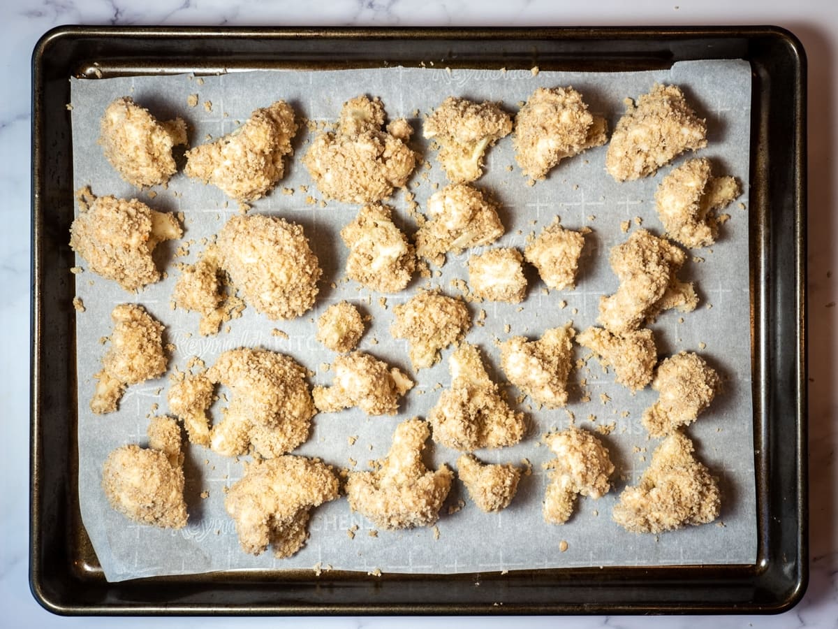 cauliflower on pan with parchment